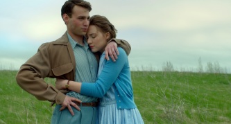 Emory Cohen as "Tony" and Saoirse Ronan as "Eilis" in BROOKLYN. Photo by Kerry Brown. © 2015 Twentieth Century Fox Film Corporation All Rights Reserved